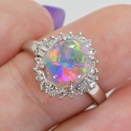A Gorgeous Australian Crystal Opal set in Platinum Ring with Diamonds